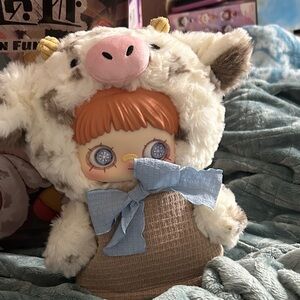 Charming Doll with Cow Hat and Blue Bow 400%